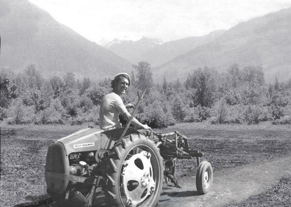 Gene Kahn driving a tractor